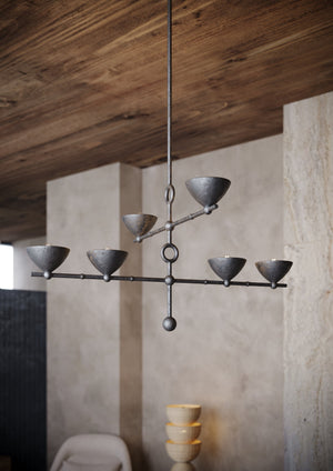 Vishal Chandelier 54" styled in a formal living room for warm, layered light at Laurie Yapp Home.