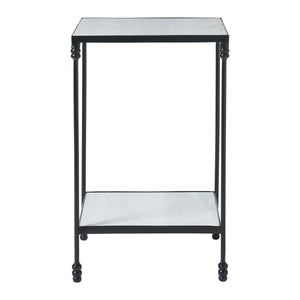Giulia table viewed from the front, showcasing a black metal frame and gray stone surface.