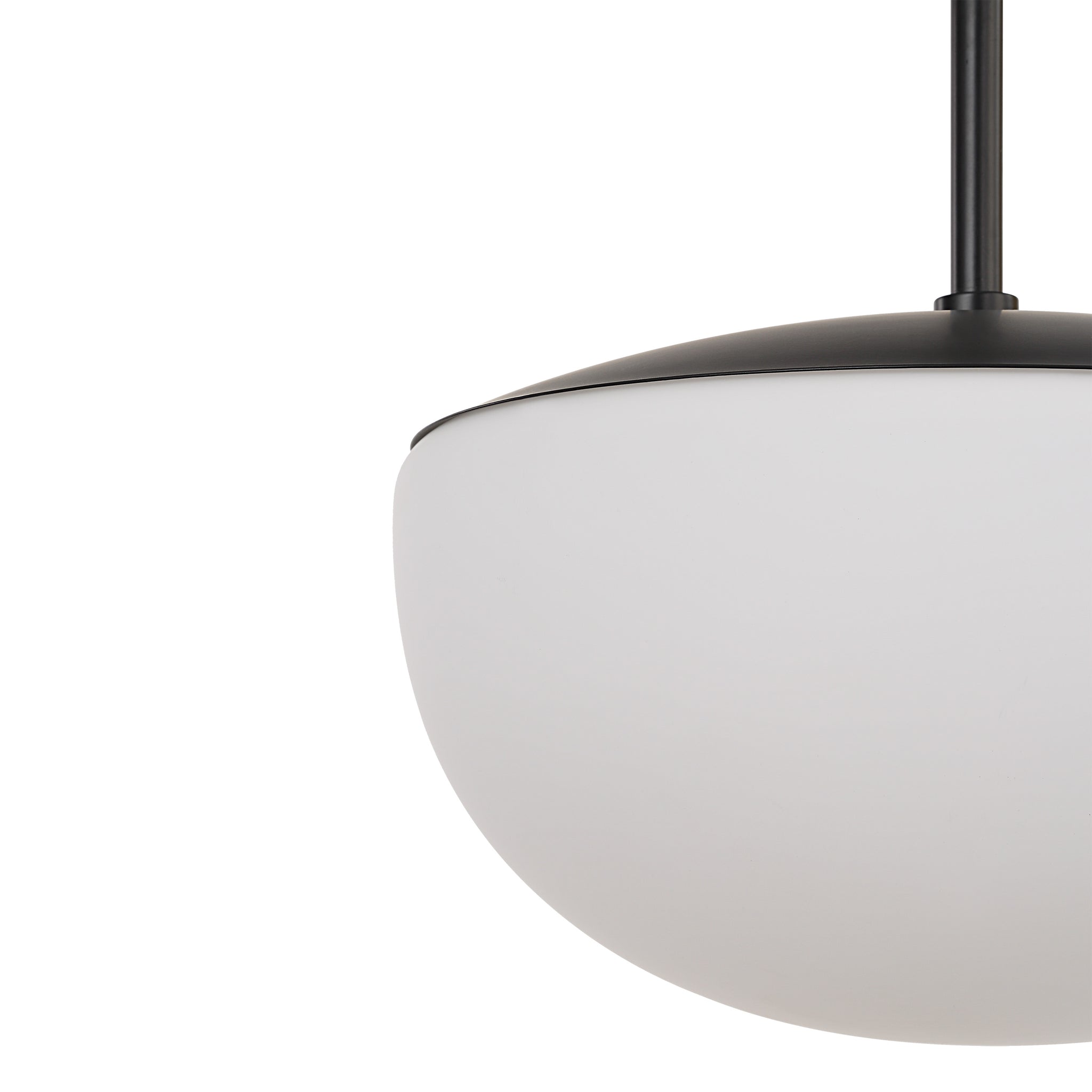 Close-up of Aditi ceiling light fixture with a black top and white globe shade, showcasing its design.