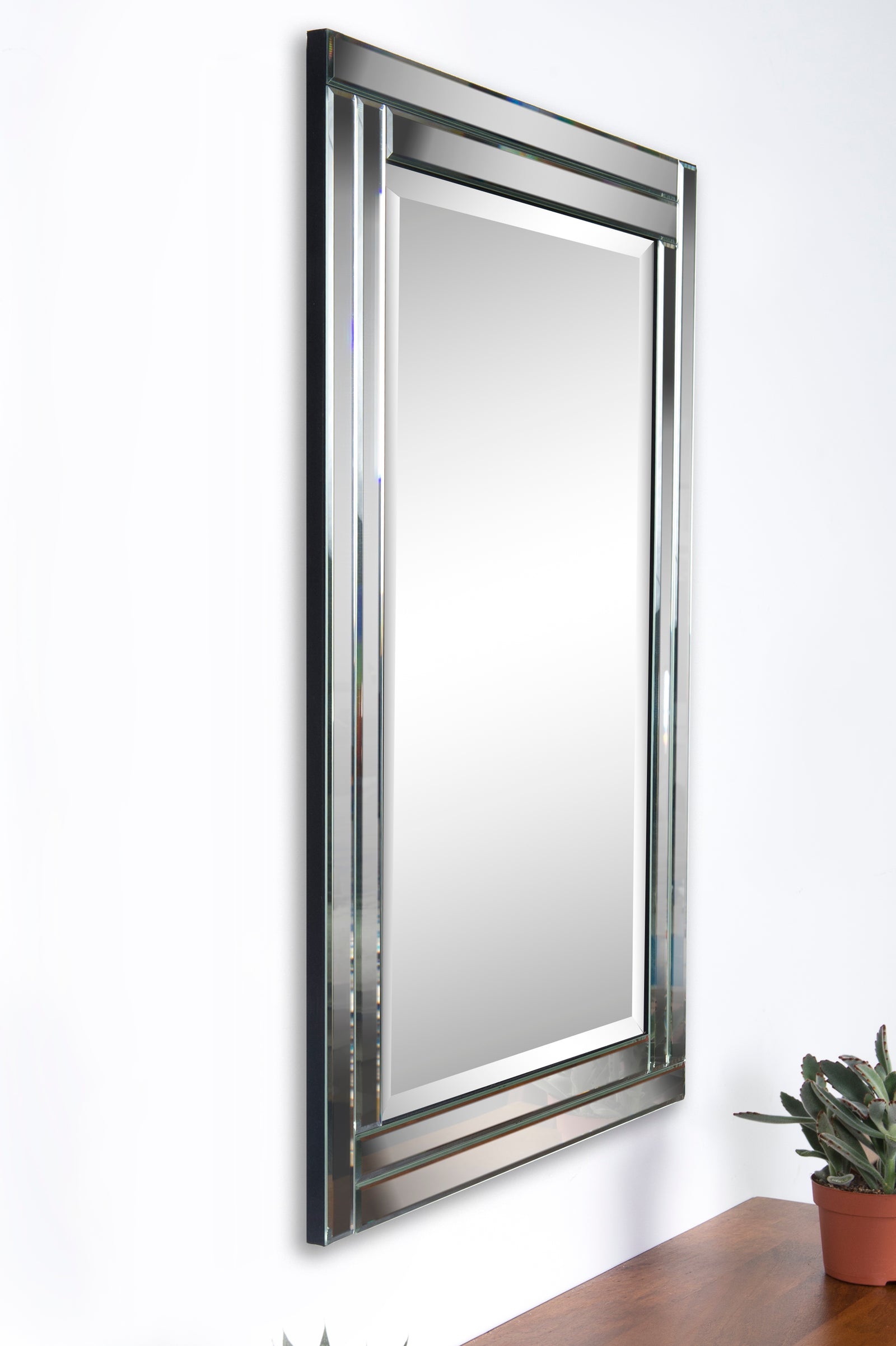 Ava Wall Mirror by Renwil with a sleek chrome frame and rectangular reflective surface.