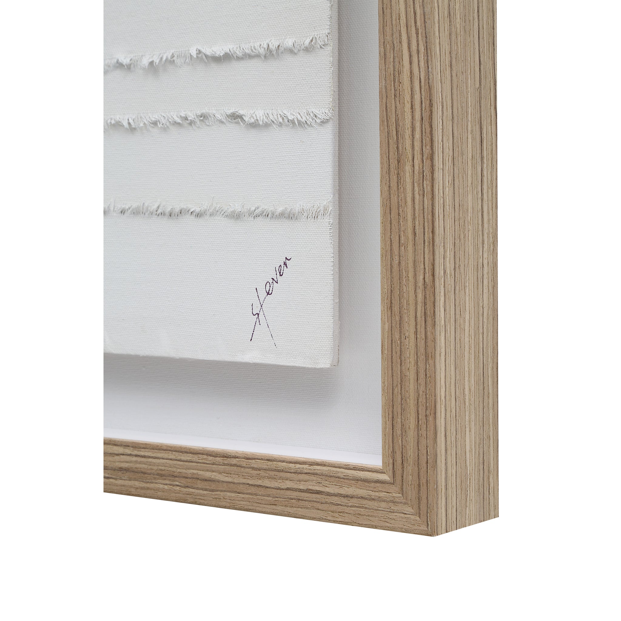 Close-up of Trax wall art featuring textured white canvas and wooden frame.
