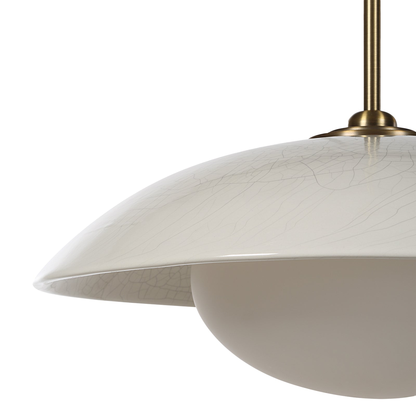 Abbie ceiling light fixture with a cream cracked finish and round glass globe