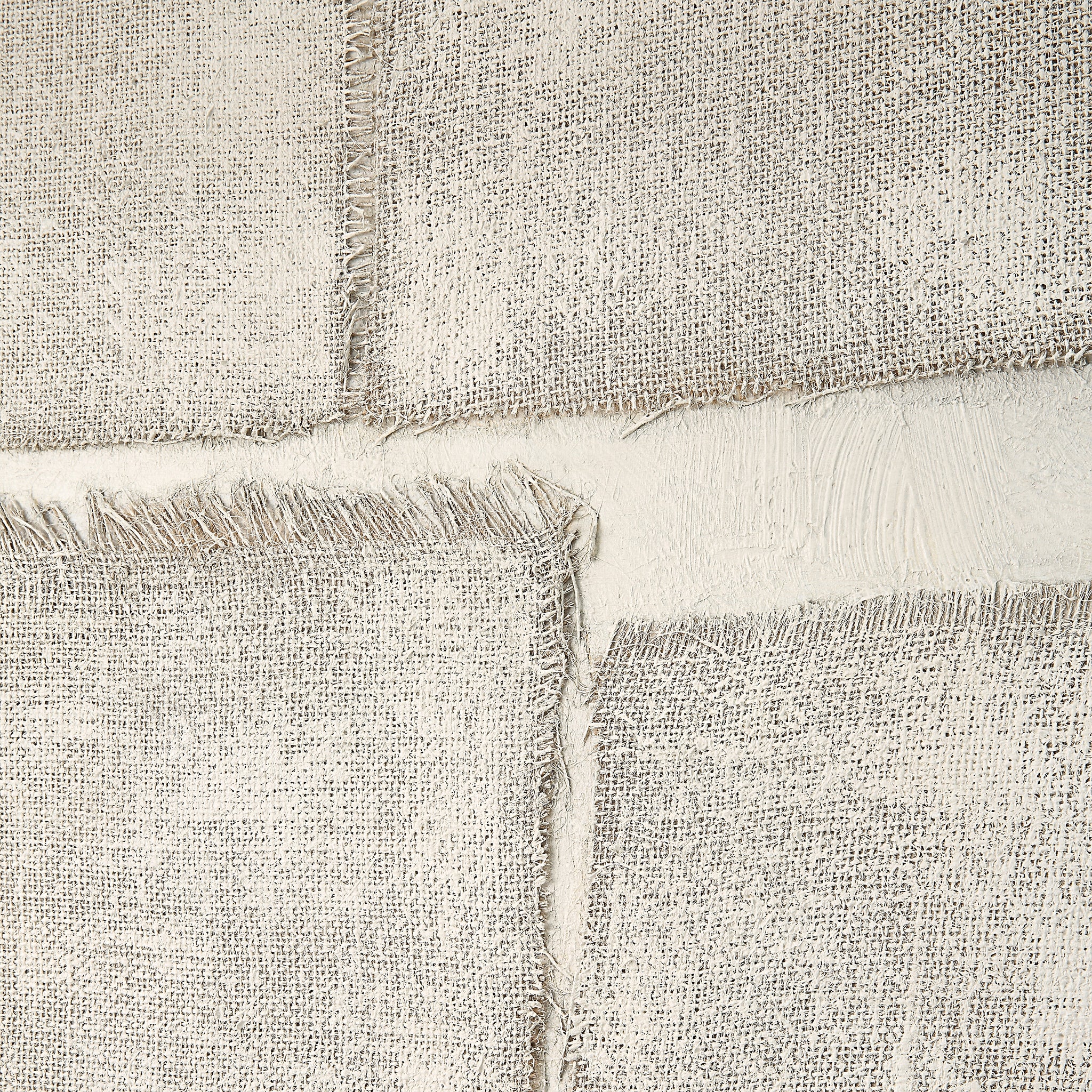 Close-up of Picardy canvas art highlighting the frayed edges of gray textured panels.
