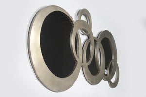 Dublin Circle Wall Mirror with a sleek design, showcasing dark circular mirrors framed in a metallic finish.