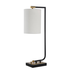 Perlato table lamp with a white cylindrical shade and black metal base, featuring gold accents.