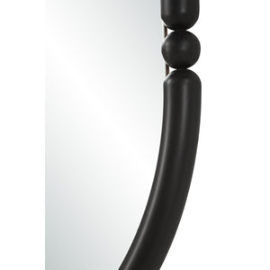 Close-up of Ditto mirror by Renwil, showcasing black frame details and round shape.