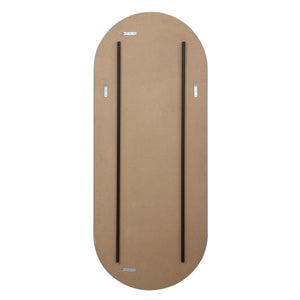 Back view of Kastelli mirror with mounting hardware and a flat surface.