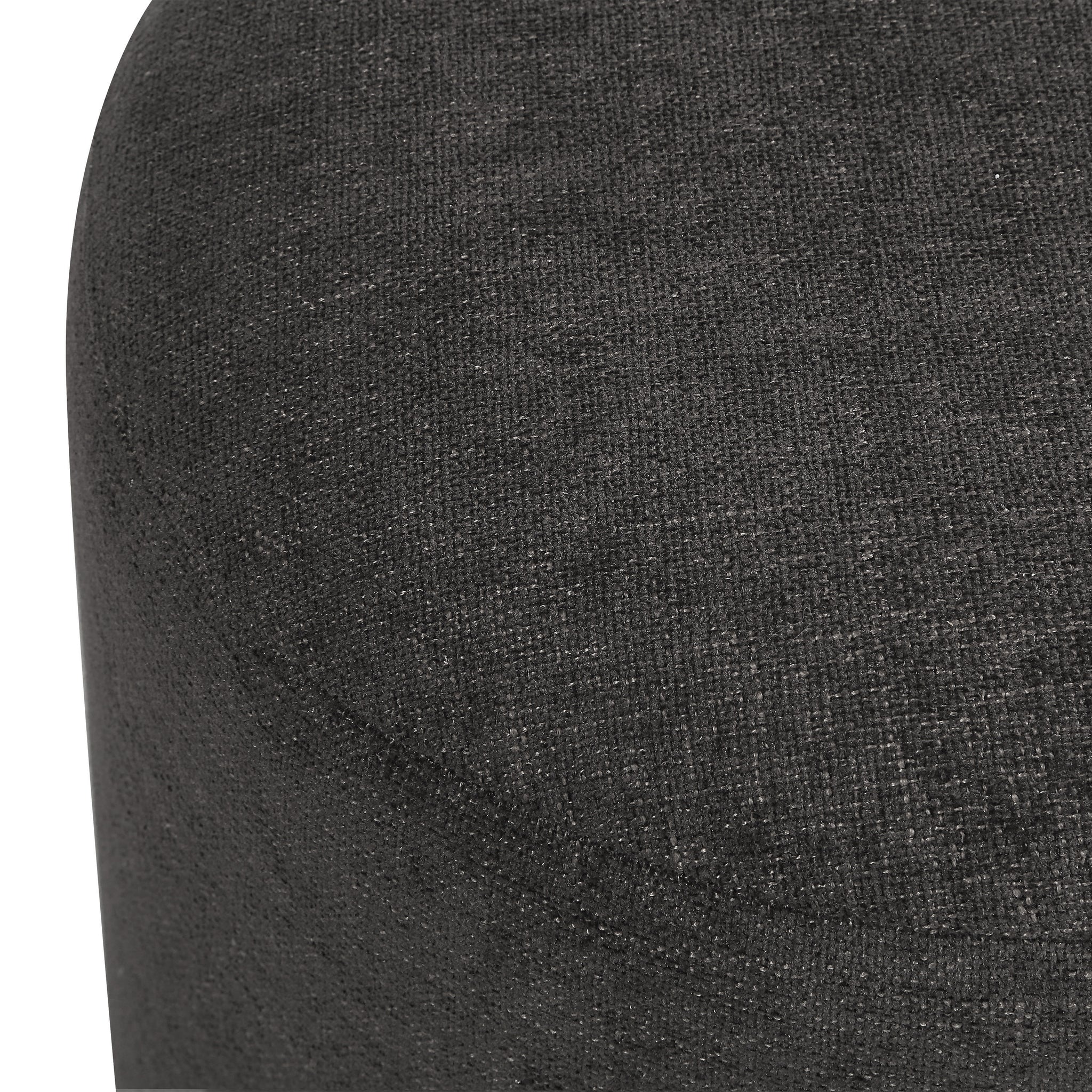 Close-up of Hevea stool in dark gray fabric, highlighting the textured surface.