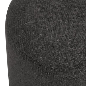 Close-up of Hevea stool in dark gray fabric, highlighting the textured surface.