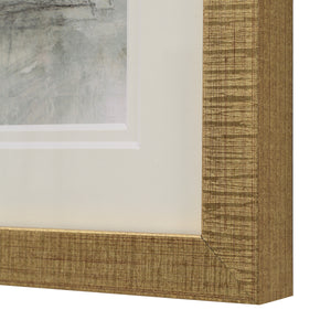 Close-up of Bellie wall art frame featuring a textured gold finish.