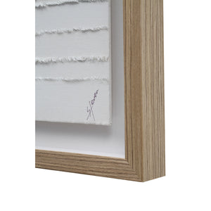 Trax wall art close-up showing white textured canvas with frayed edges, framed in light wood.