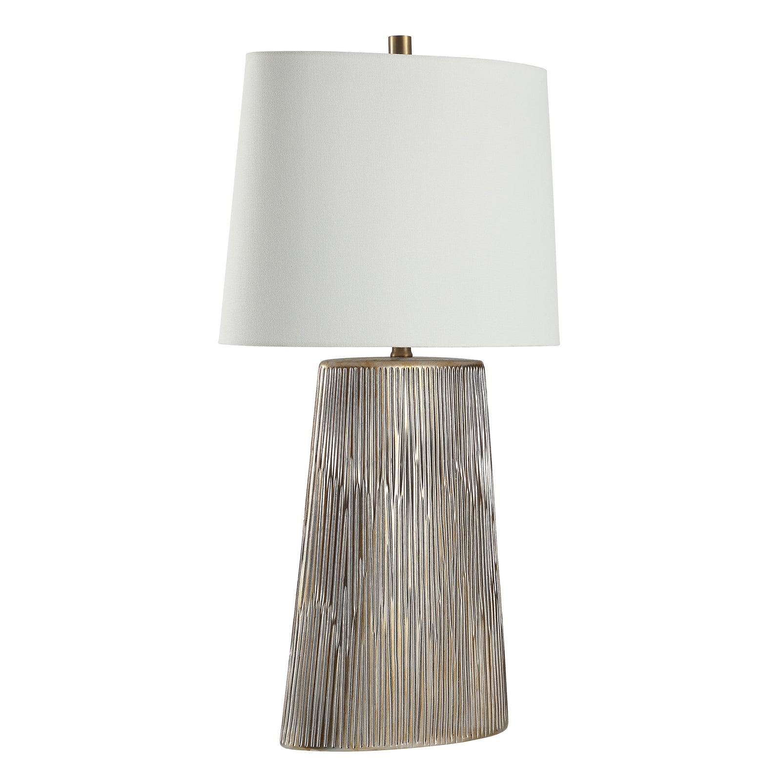 Calma Table Lamp with a textured silver base and white fabric shade