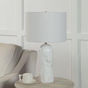 Beausoleil Table Lamp on a side table next to a beige armchair and a cup
