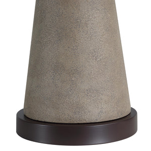 Close-up of Lourdes Table Lamp's gray textured base and dark circular base.