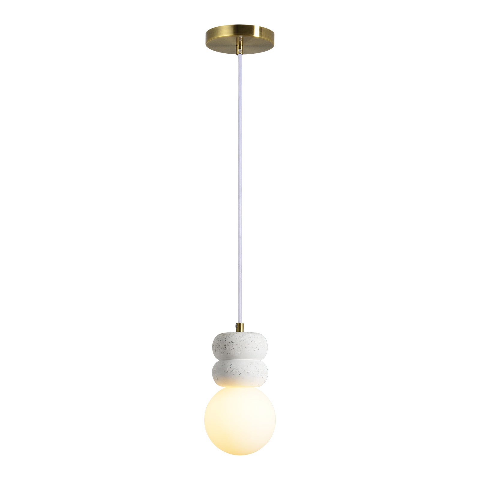 Candra Ceiling Fixture with white glass globe and textured white ceramic accents, hanging from a brass mount.