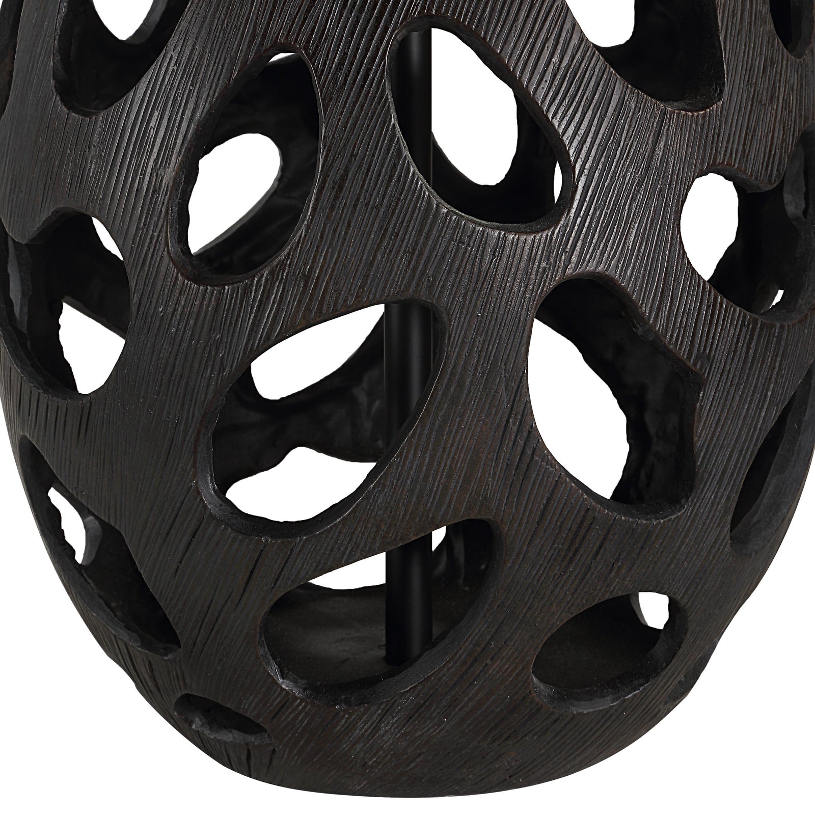 Loxley Table Lamp with a textured black base and white drum shade, showcasing a modern design.