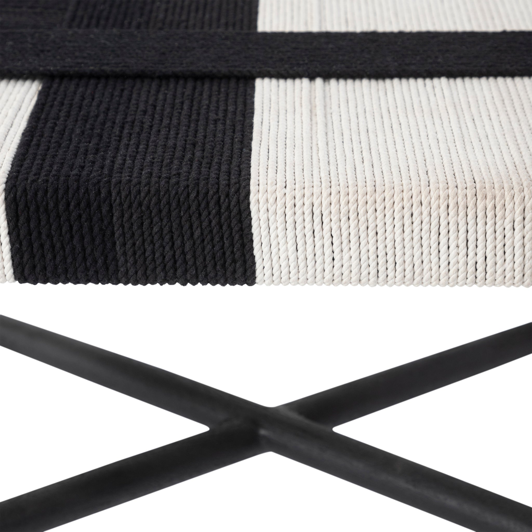 Plex stool by Renwil featuring a black and white woven seat with a modern design.