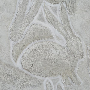 Close-up of Lacey canvas art highlighting the textured surface of rabbits in gray.