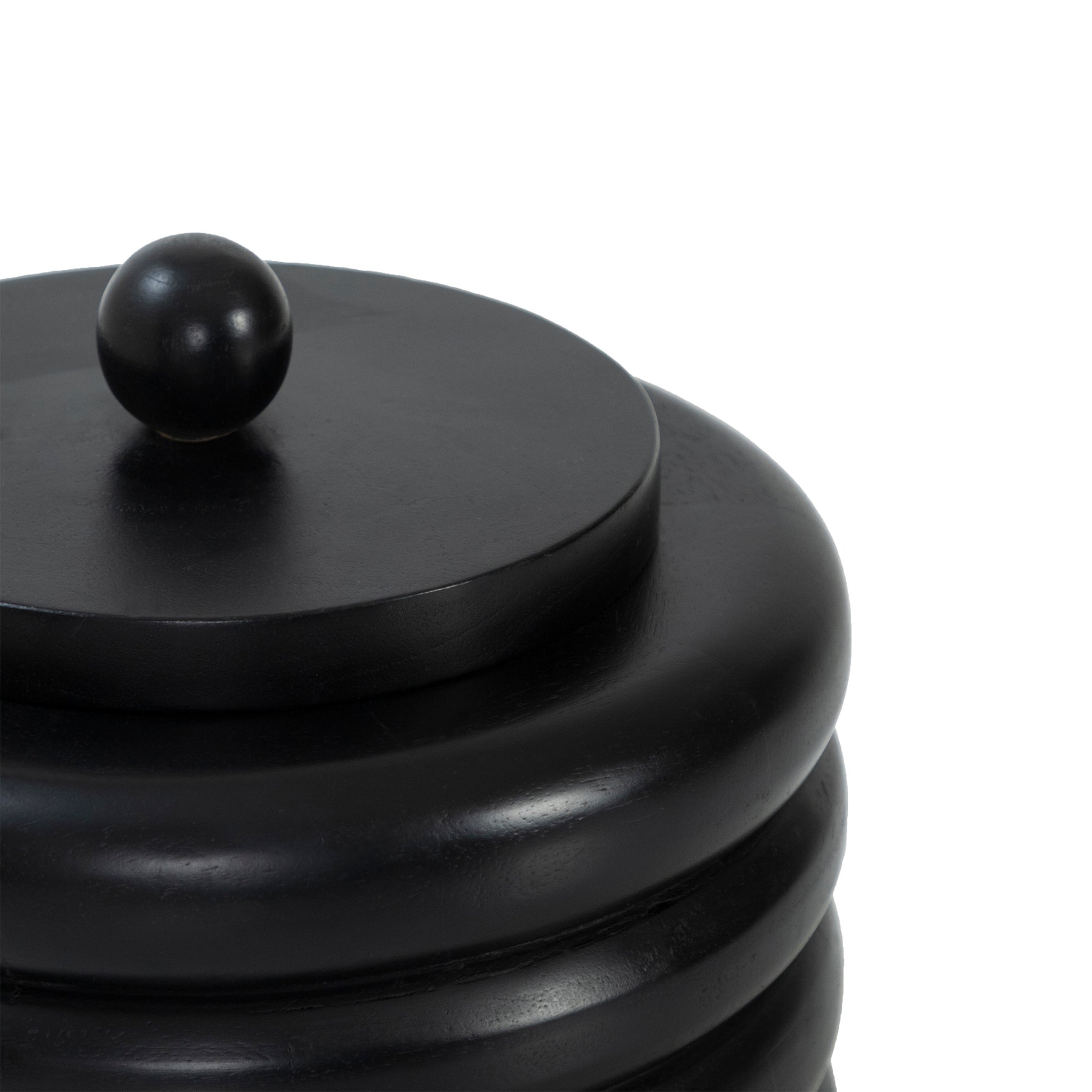 Close-up of Cipher bookends by Renwil, black stacked design featuring a round top knob.