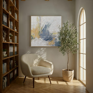 Eclat canvas art displayed in a cozy room setting with a chair and bookshelf.