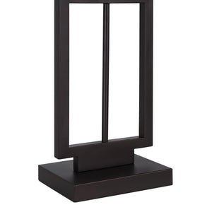 Close-up of Sendai table lamp's dark metal base and geometric design, highlighting craftsmanship.