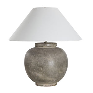 Olivia Table Lamp with a round gray ceramic base and a white fabric shade