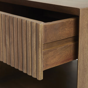 Close-up of the Jaime side table's textured drawer front, emphasizing the wood detail.