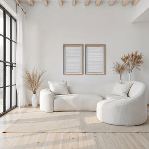 Trax wall art in a modern living room with a white sofa and natural decor.