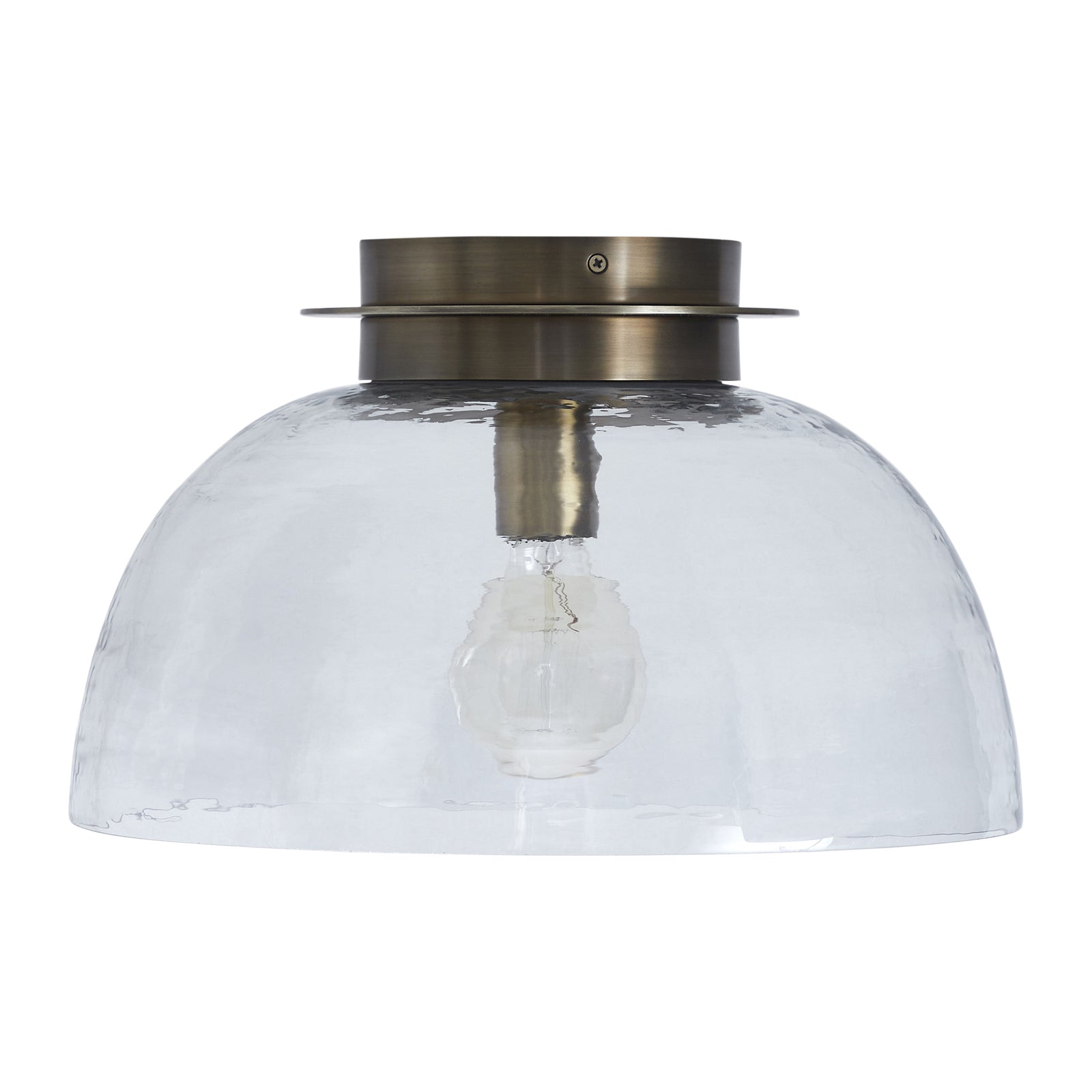 Liliane Flush Mount light with a clear glass dome and brass fixture, top view.