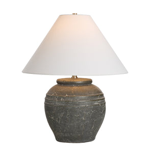 Lino Table Lamp with illuminated white shade, showcasing gray ceramic base and elegant design.