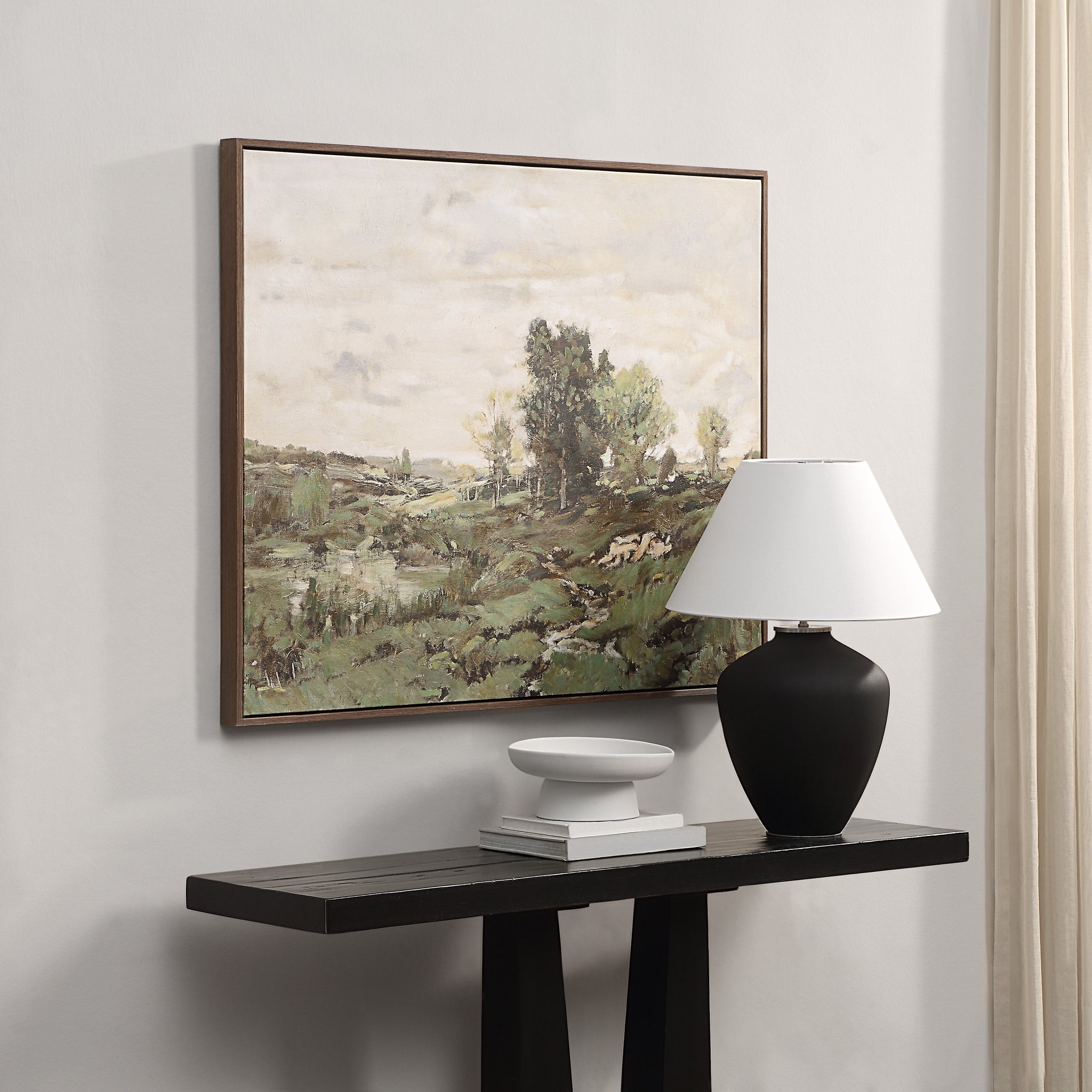 Nature canvas art by Renwil displayed on a wall above a table with a lamp and decor.