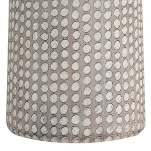 Close-up of Lechuga Table Lamp's textured ceramic base with a dotted design in light gray.