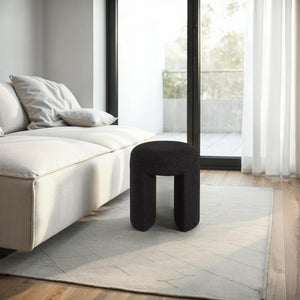 Amrah stool by Renwil in a modern living room setting beside a sofa