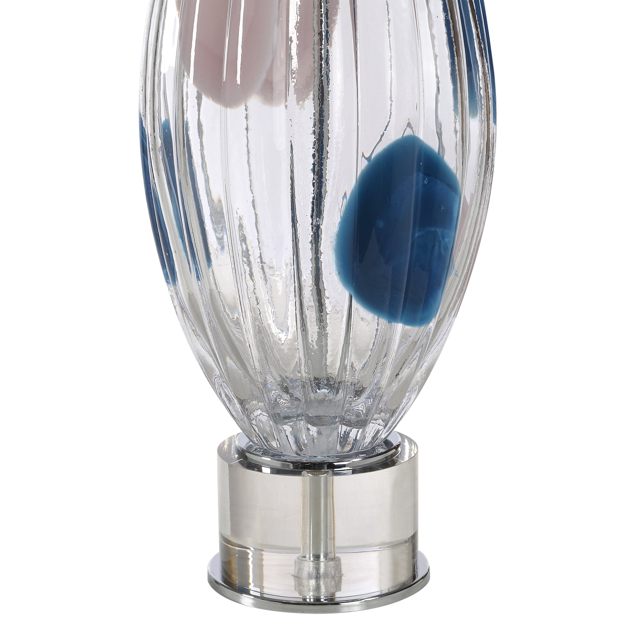 Close-up of Luxor Table Lamp's clear glass base with blue and pink accents and chrome details