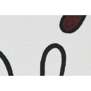 Close-up of Erin Indoor Pillow highlighting textured patterns on white fabric