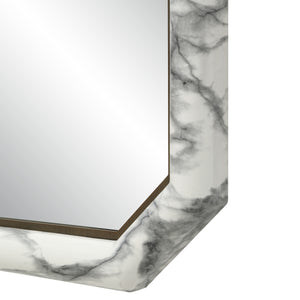 Close-up of Venus mirror showcasing the marble-patterned frame and reflective surface