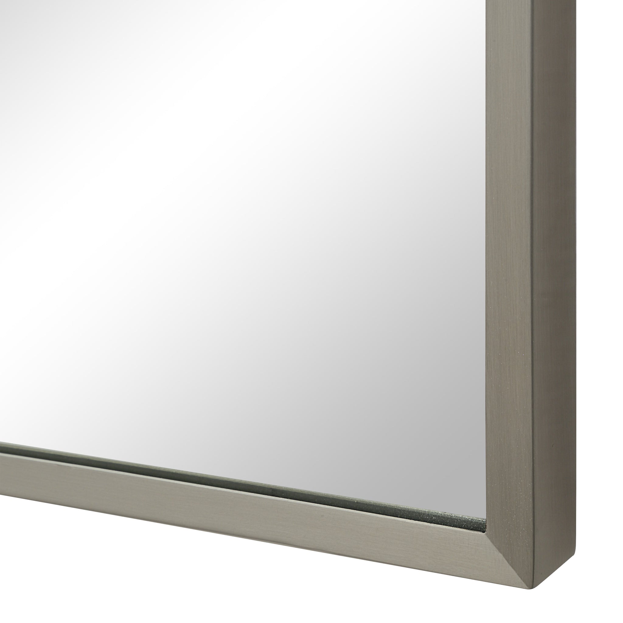 Close-up of Salma mirror's silver frame edge, highlighting the sleek design