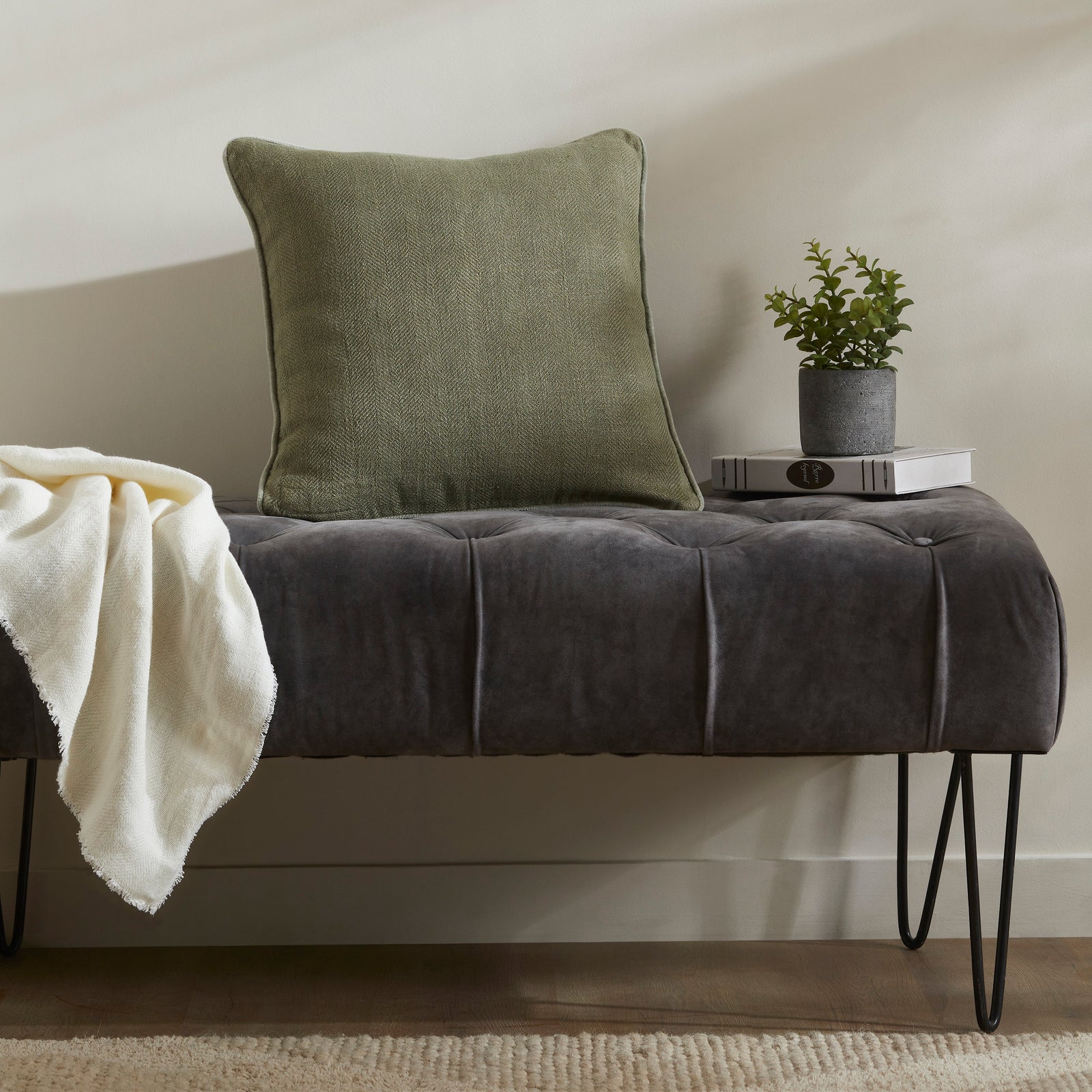 Lavigne Indoor Pillow in olive green with herringbone pattern and piped edges.