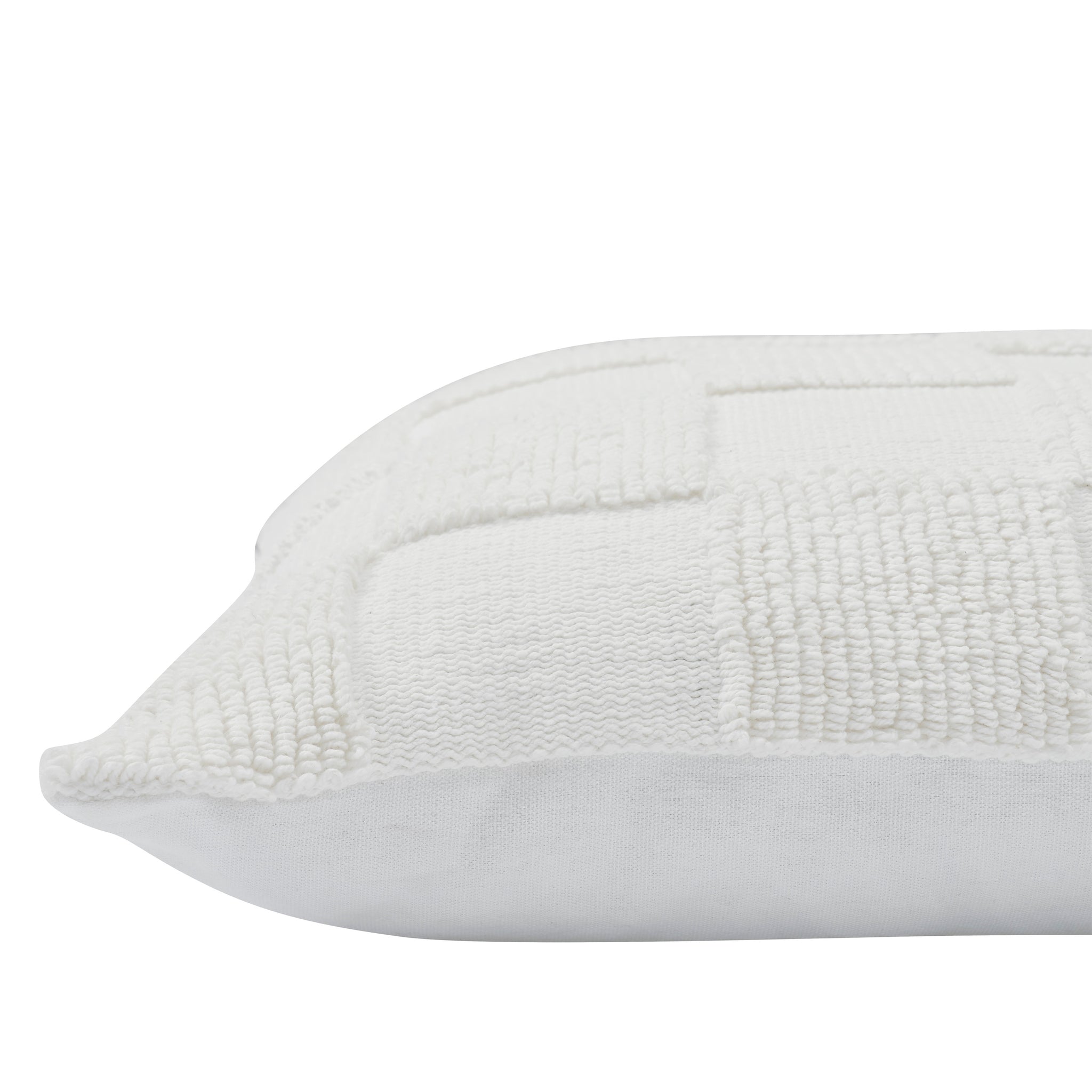 Profile view of Terrah Indoor Pillow showcasing its white texture