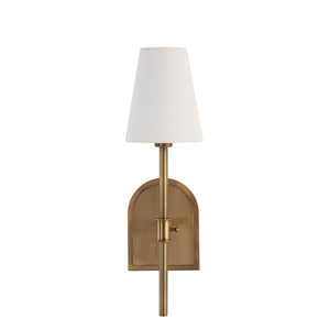 Montreux wall sconce with a white fabric shade and brass finish, featuring a sleek design.