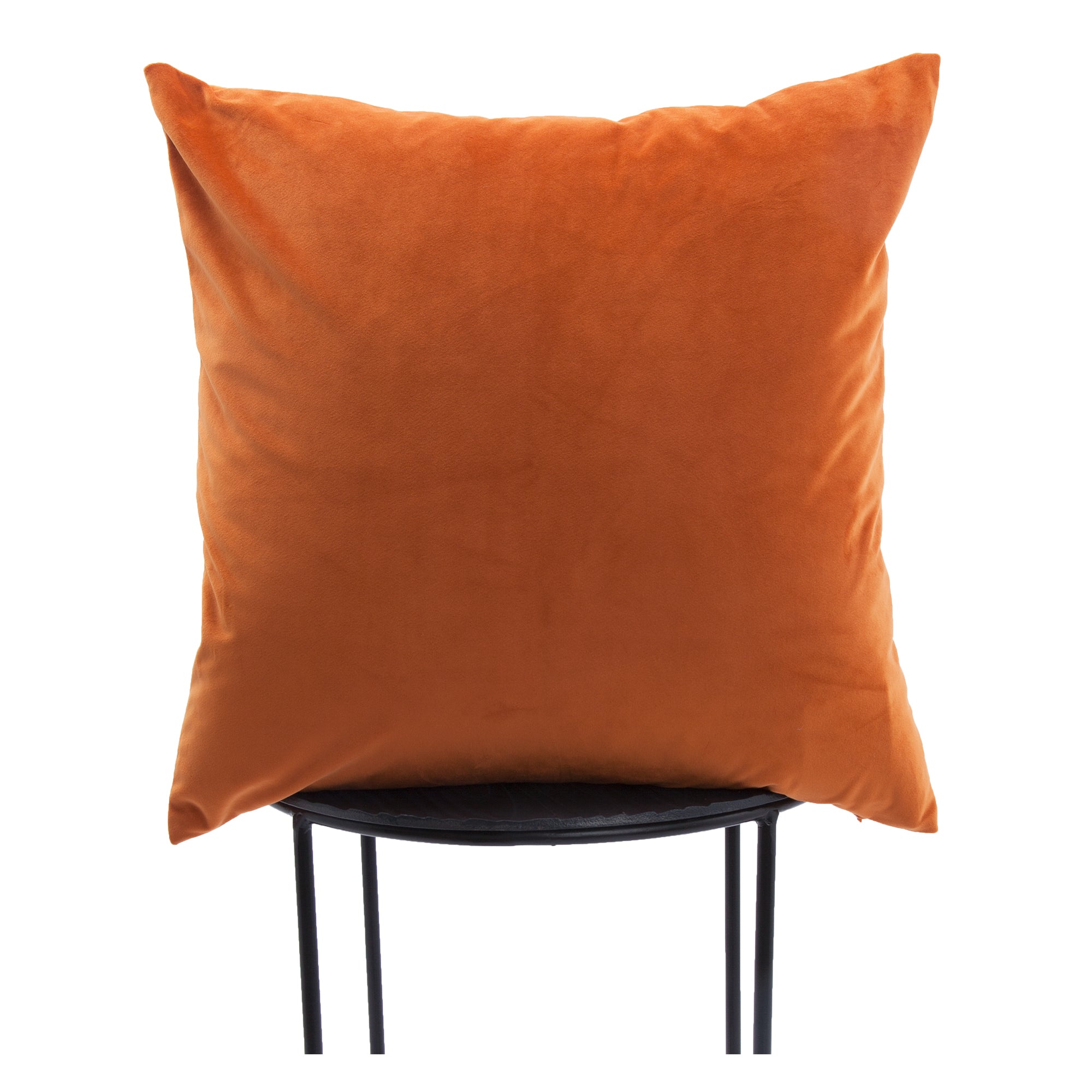 Prato Indoor Pillow in orange velvet, displayed on a black metal chair, highlighting its square shape.