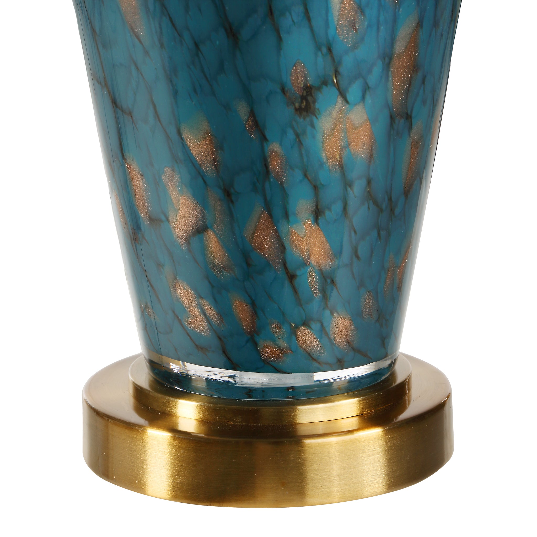 Close-up of Milo Table Lamp's teal ceramic base with gold flecks and a gold circular base.