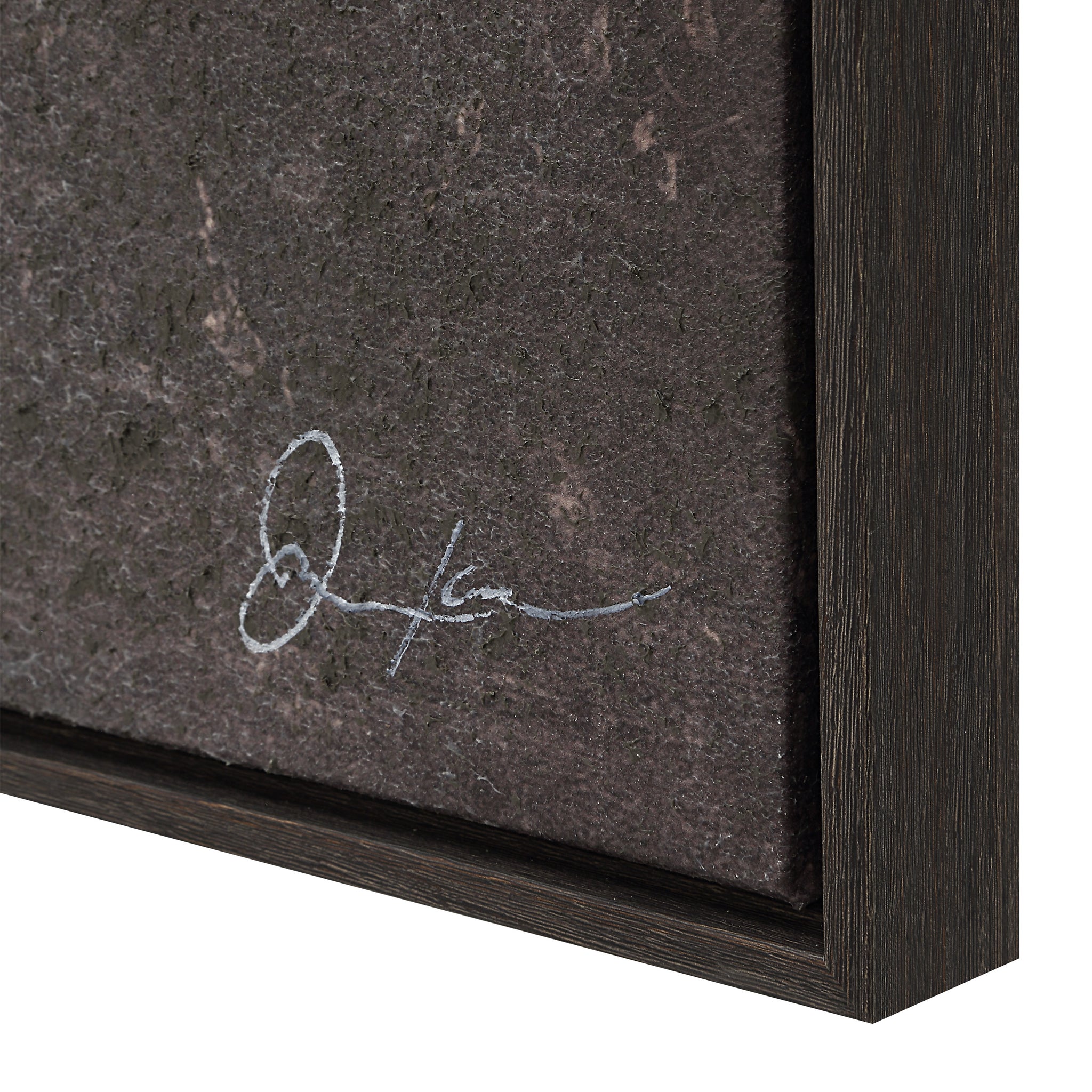 Close-up of the Falco canvas art signature on a textured surface, with a dark wooden frame.