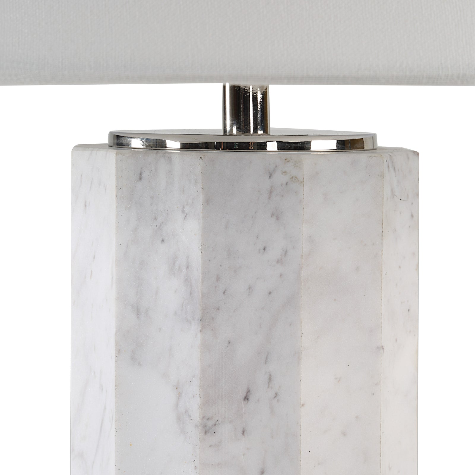 Veda table lamp with a white fabric shade and a marble base in a modern design.