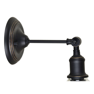 Renta Wall Sconce in black metal, highlighting the wall mount and arm design without the glass shade.