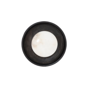 Haloa wall sconce with a round white alabaster bulb in a black wooden base