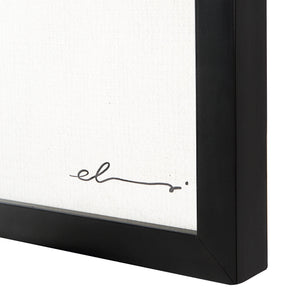 Close-up of Cercola wall art frame, highlighting the black frame and signature detail.