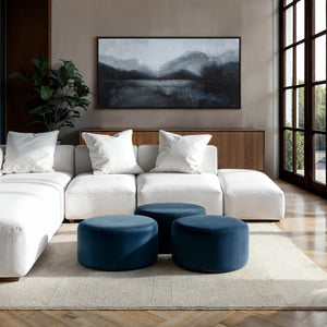 Atlanta canvas art by Renwil featuring abstract landscape in gray and blue tones above a white sofa