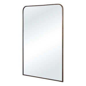 Jackline mirror by Renwil viewed at an angle, featuring a smooth bronze frame and a bright reflective surface.