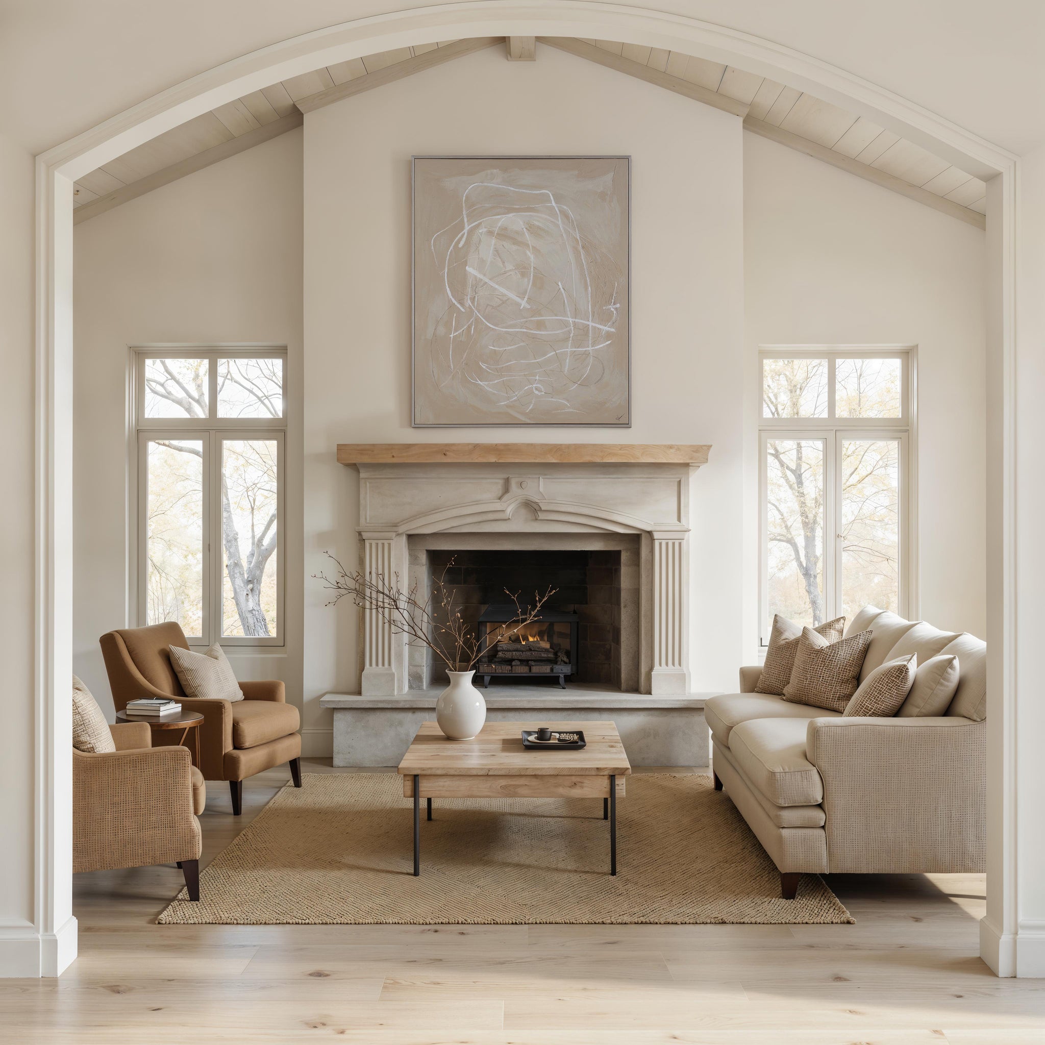 Naxos canvas art displayed above a stone fireplace in a modern living room.